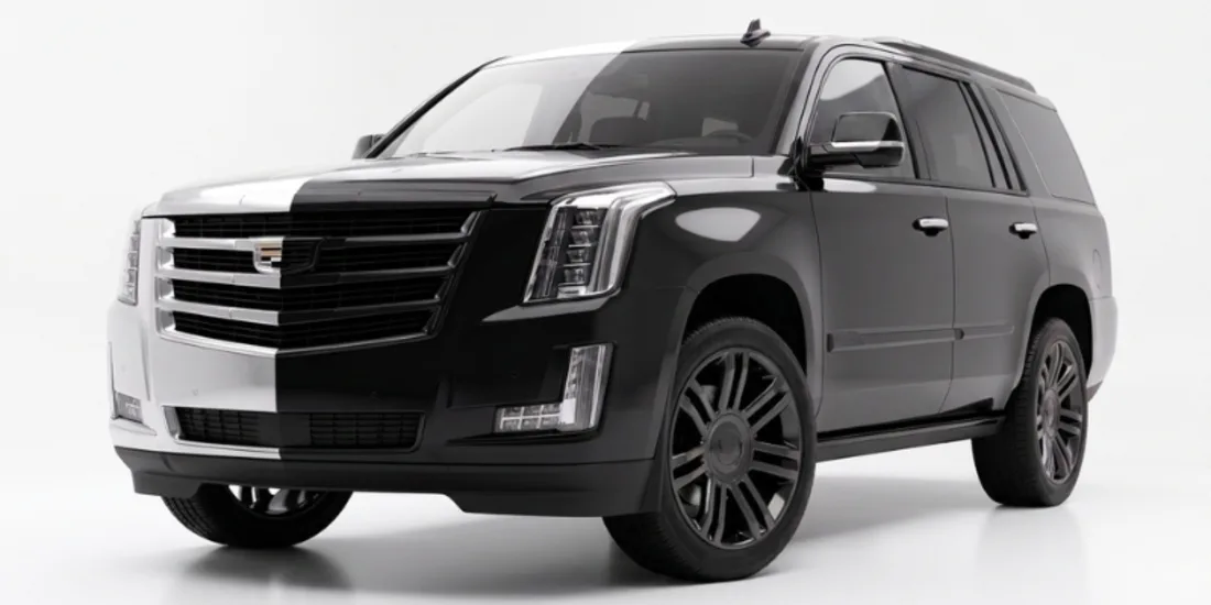 Cadillac Escalade with chrome trim blacked out by vinyl chrome delete